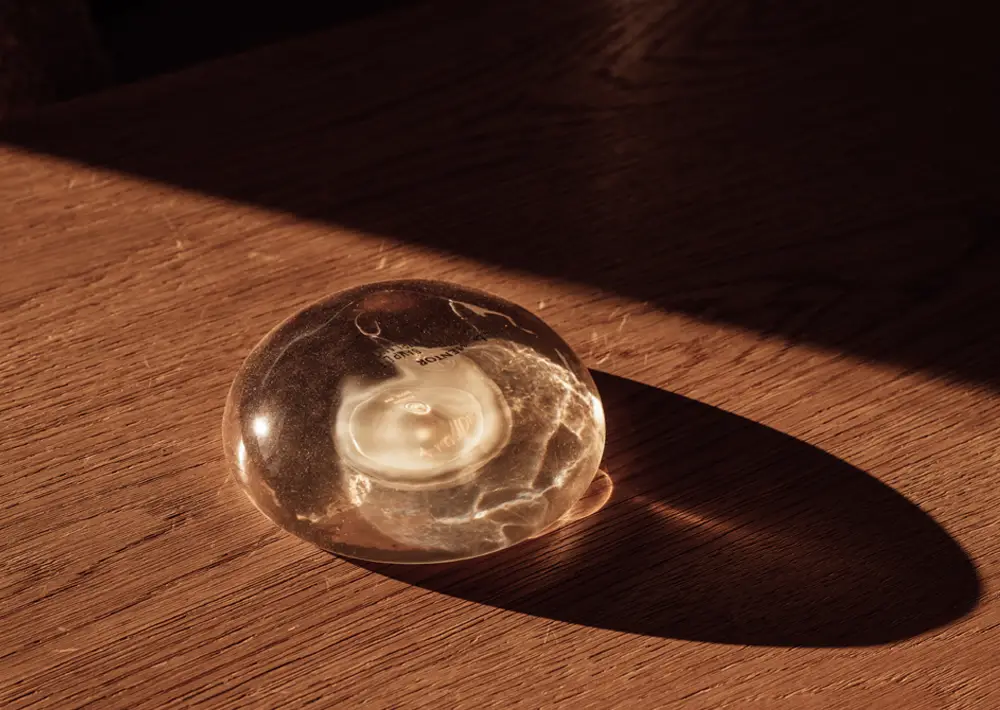 Still life picture of a breast implant on a table